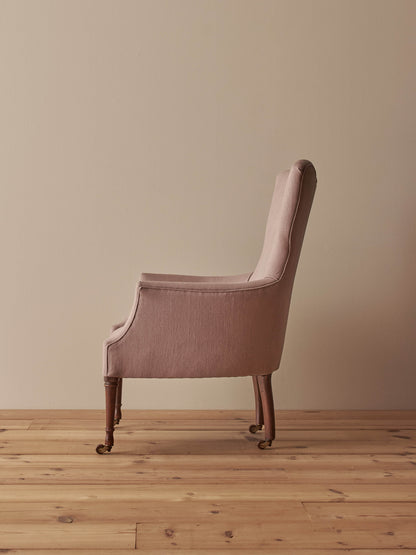 Victorian armchair raised on castors