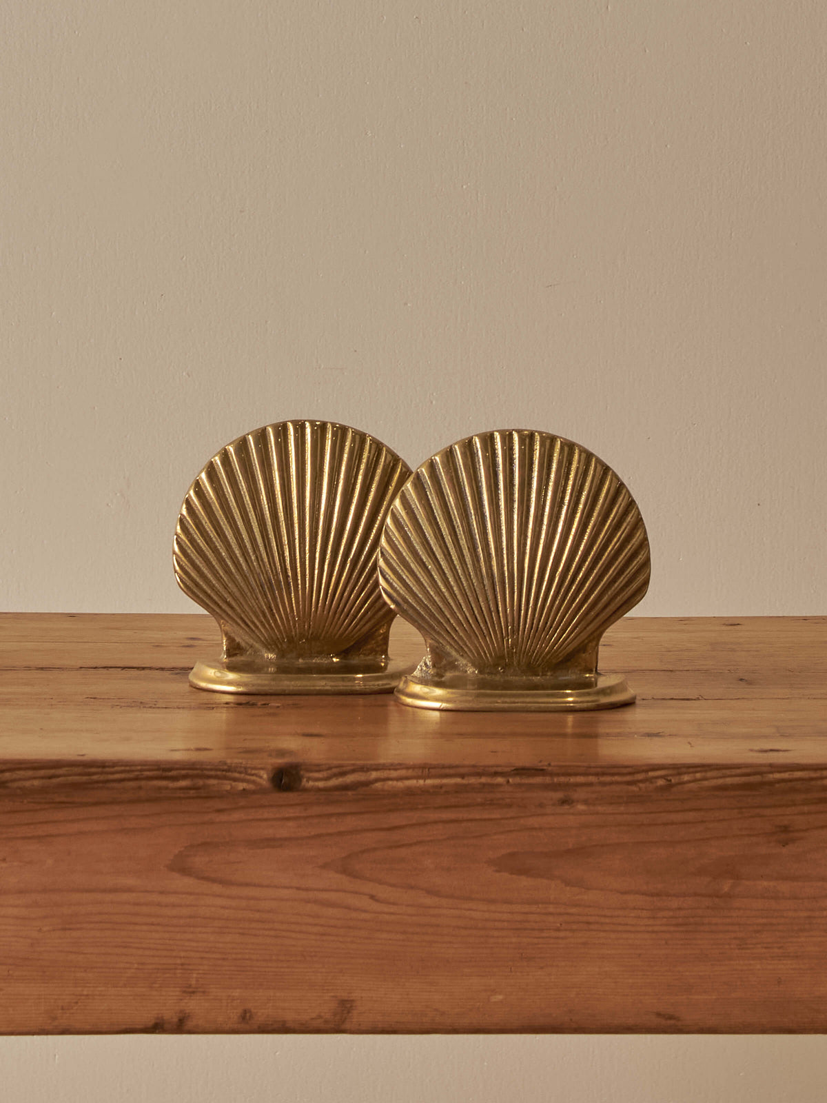 Pair of vintage mid-century brass clam-shell bookends