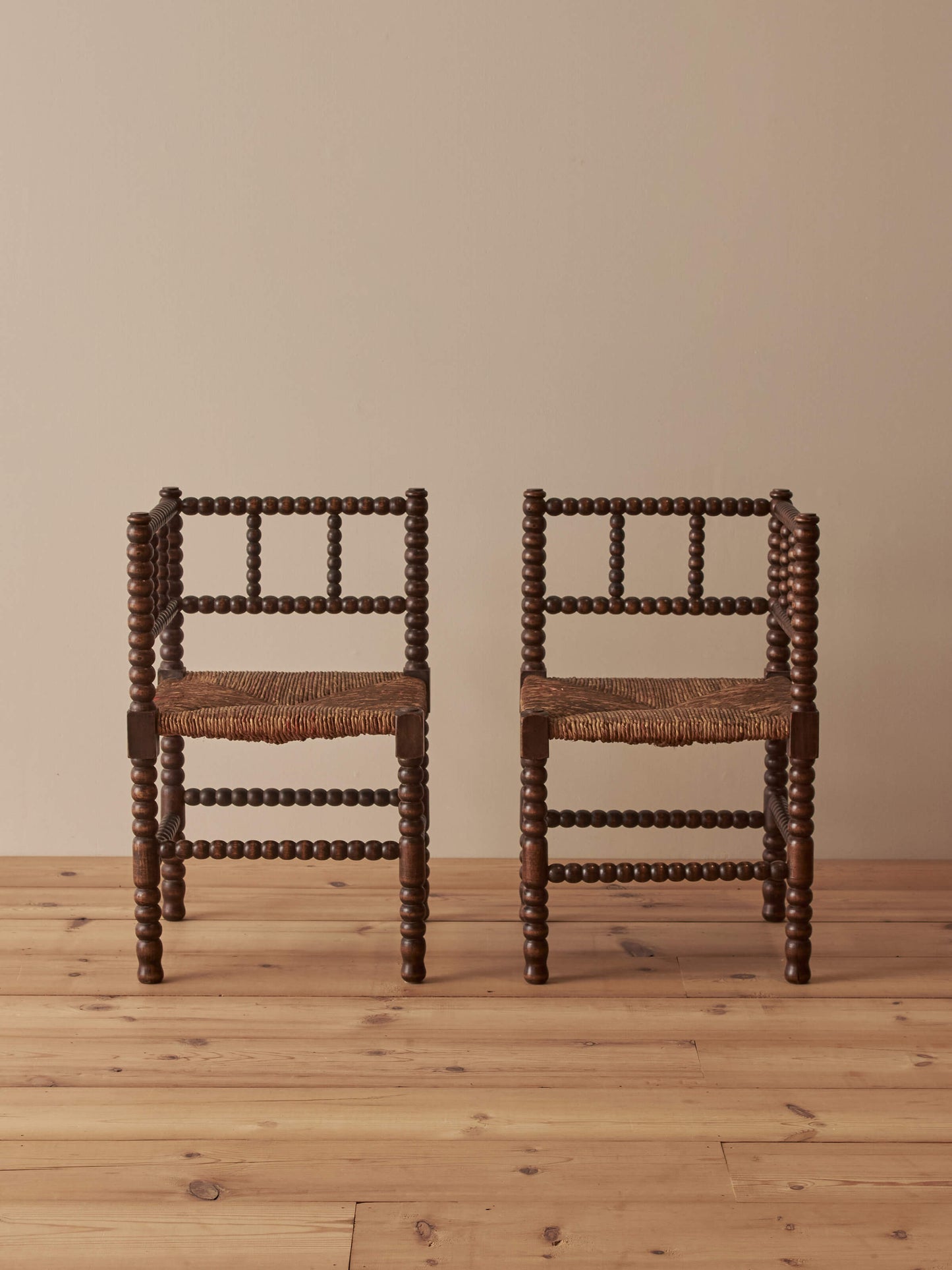 Pair of French mid-century bobbin corner chairs