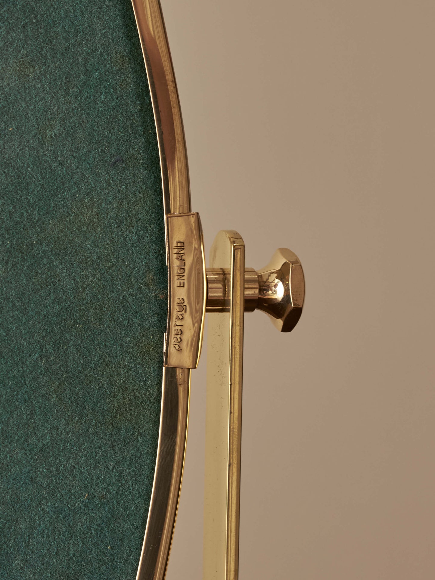 Vintage brass Peerage mirror