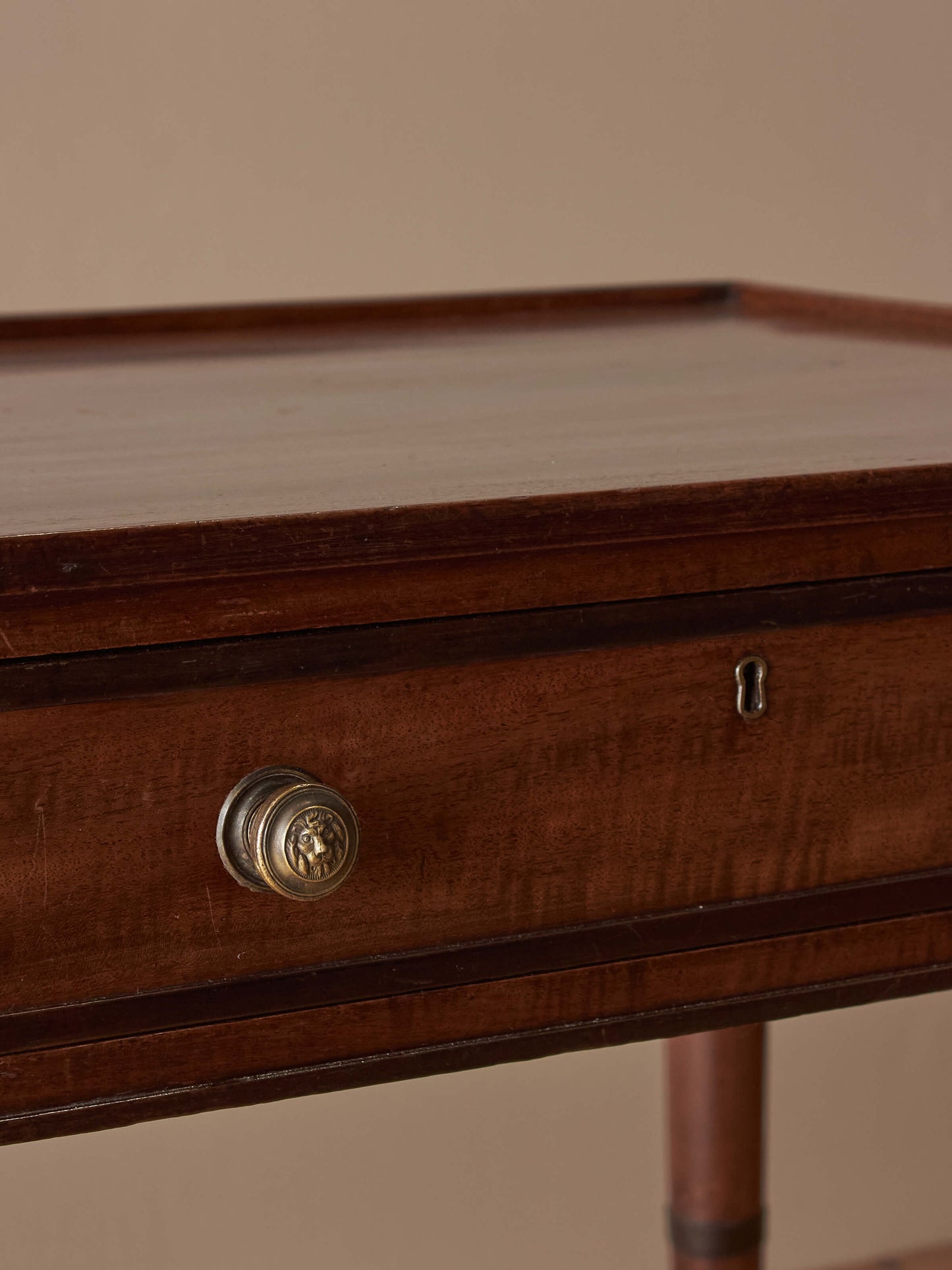 Regency mahogany desk on brass castors
