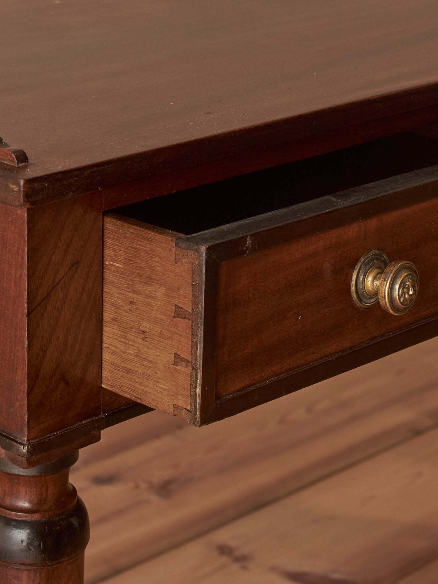 Regency mahogany desk on brass castors