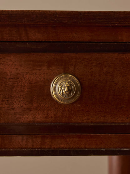 Regency mahogany desk on brass castors