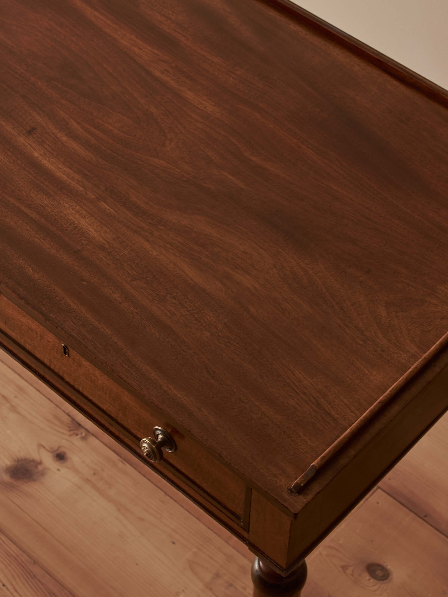 Regency mahogany desk on brass castors