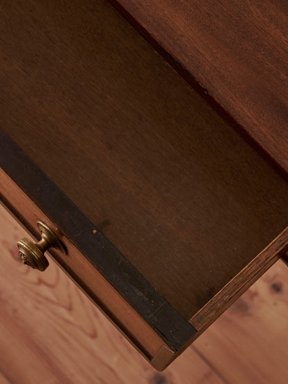 Regency mahogany desk on brass castors