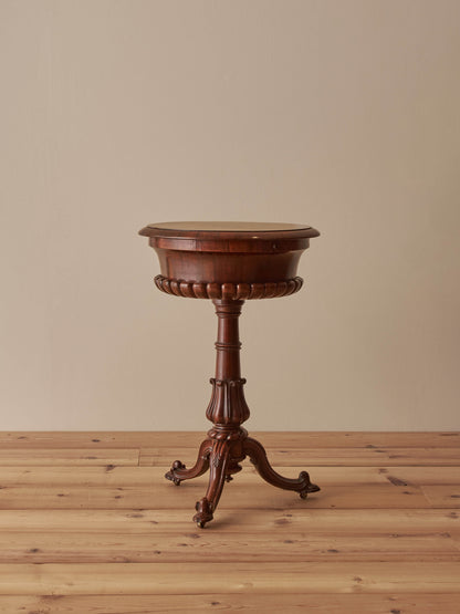 Regency rosewood teapoy table on castors
