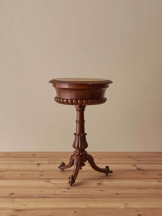 Regency rosewood teapoy table on castors
