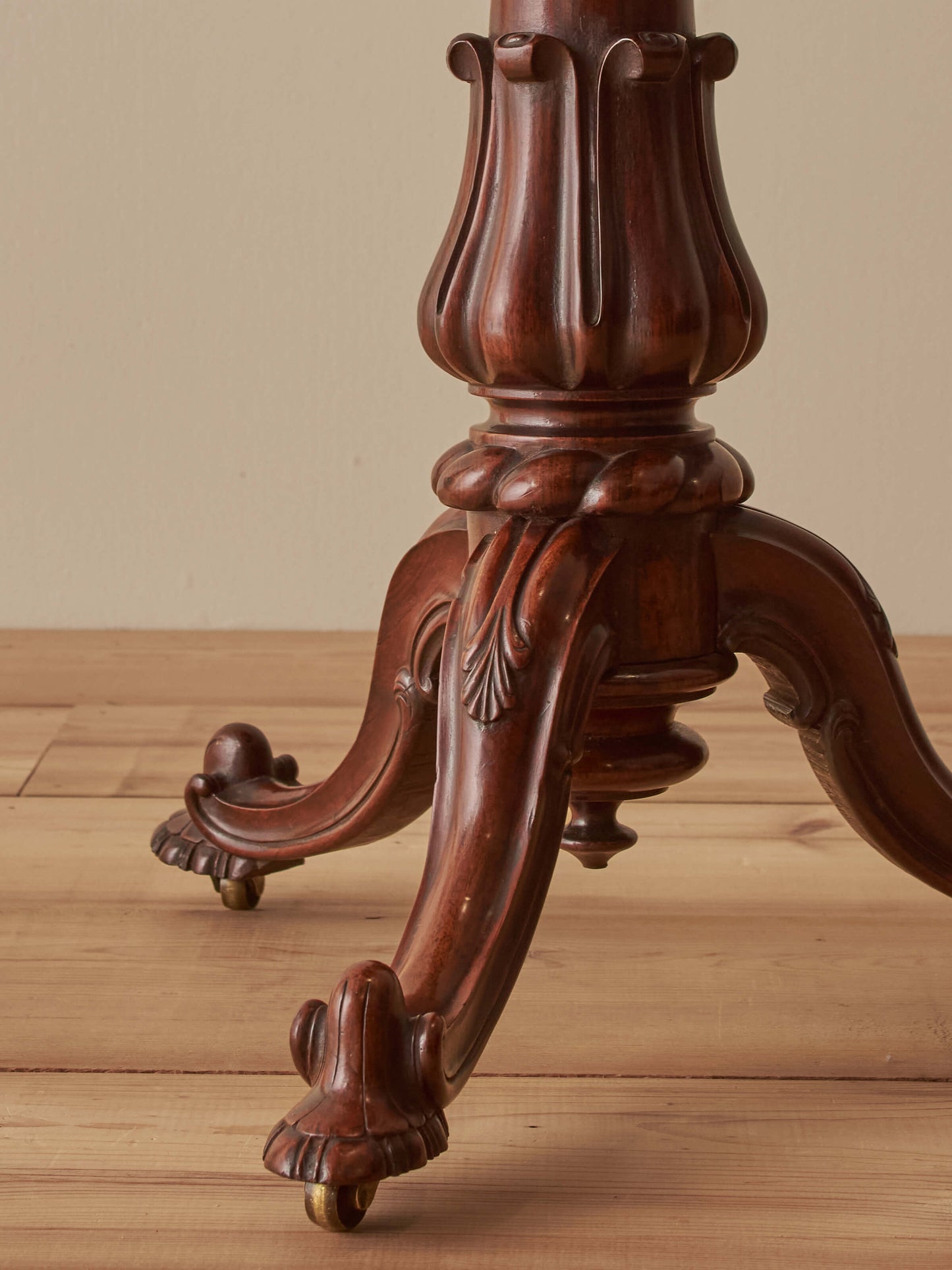 Regency rosewood teapoy table on castors