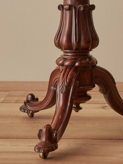 Regency rosewood teapoy table on castors