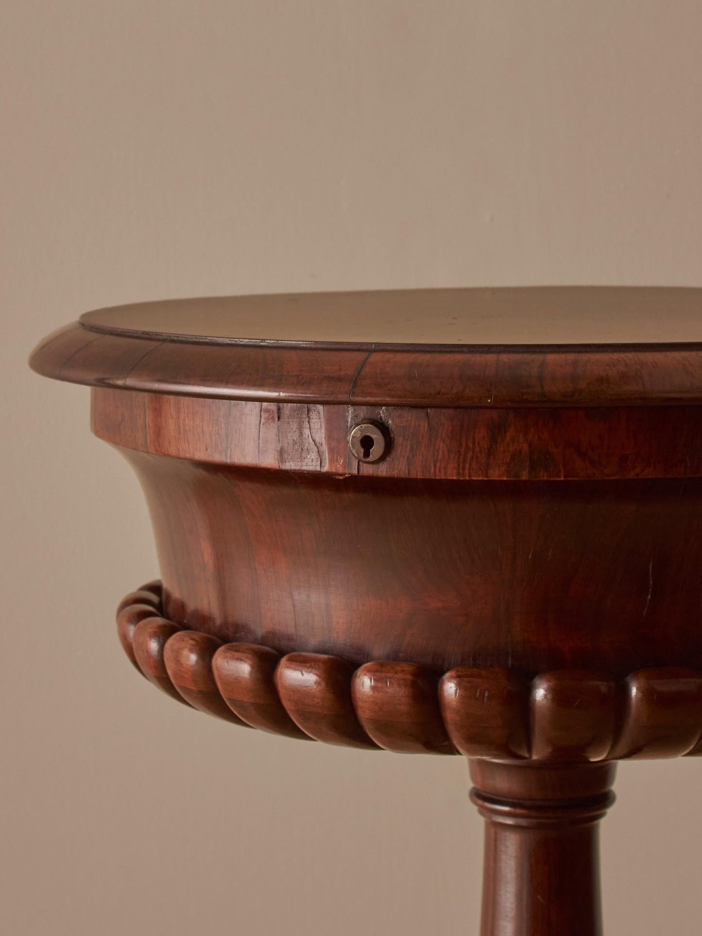Regency rosewood teapoy table on castors