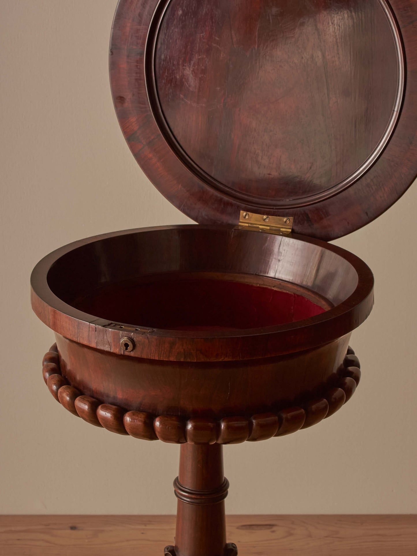 Regency rosewood teapoy table on castors