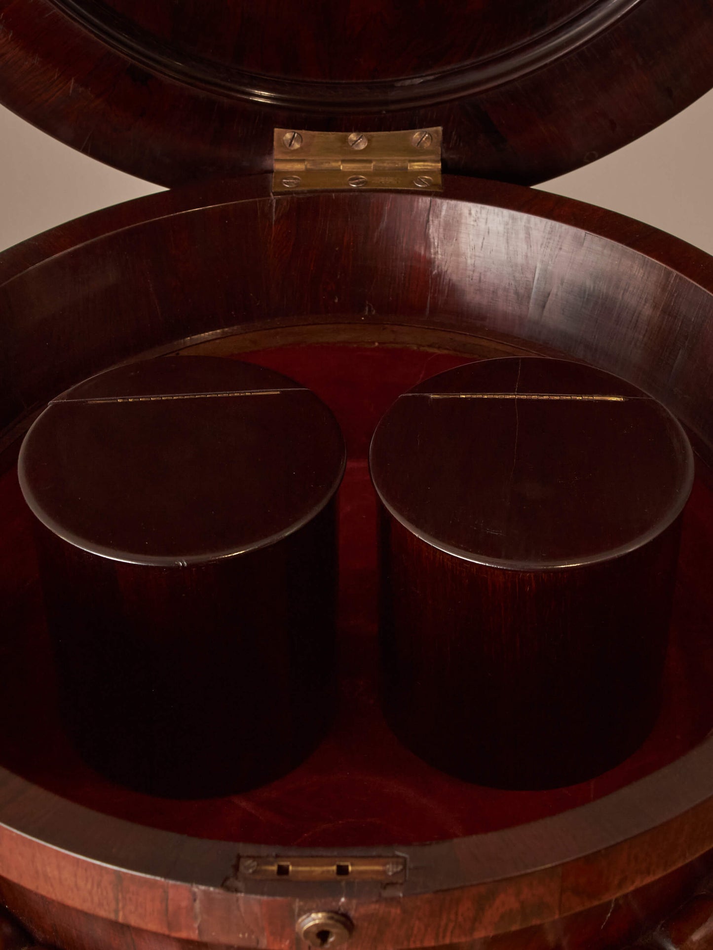 Regency rosewood teapoy table on castors