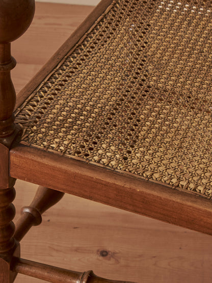 French antique cane chair on castors