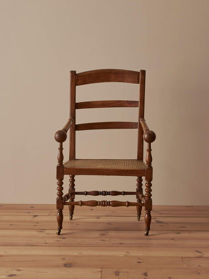 French antique cane chair on castors