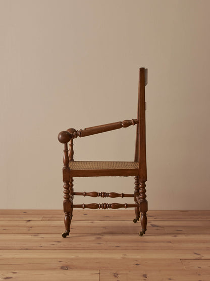French antique cane chair on castors