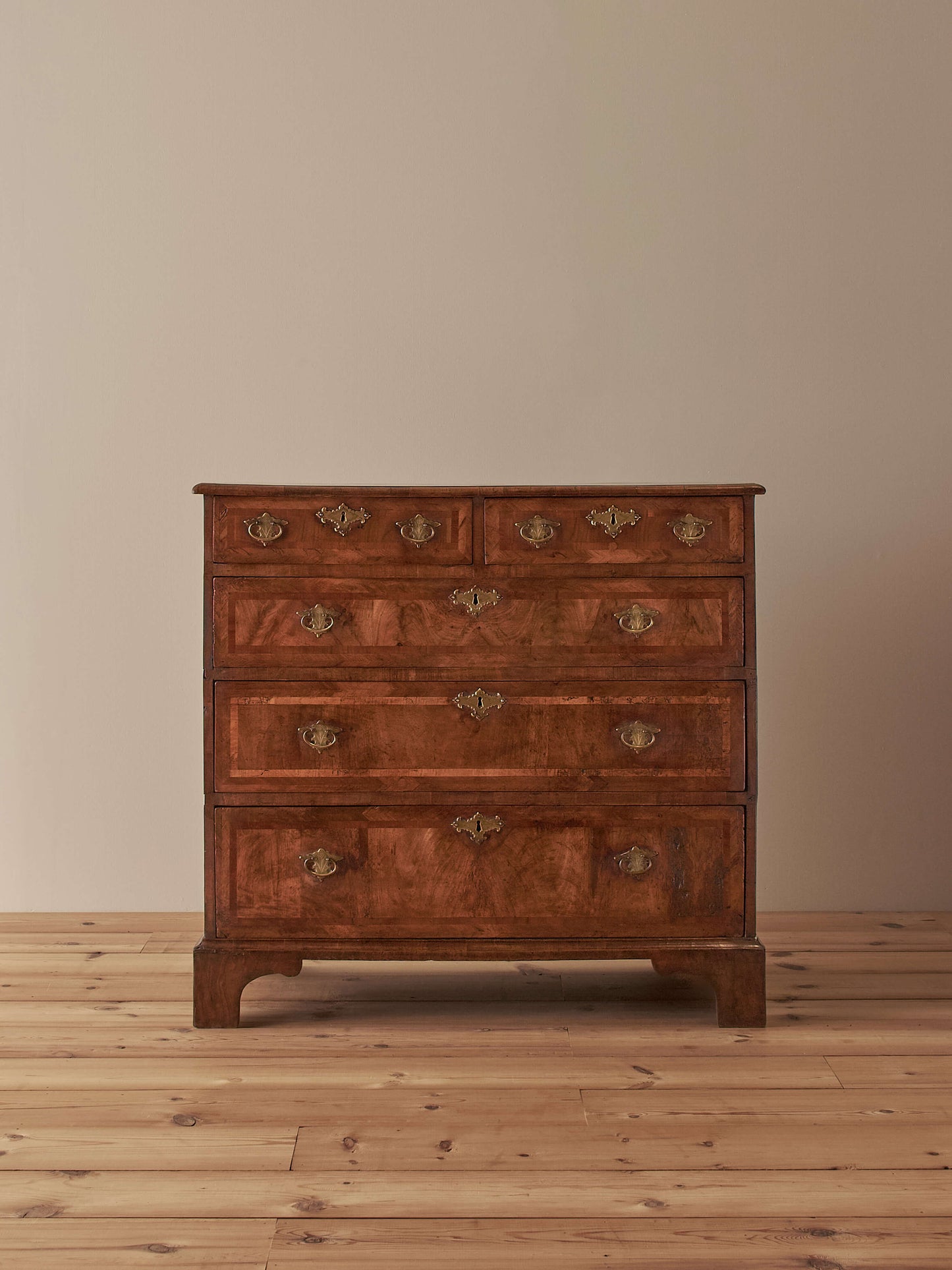 George I walnut cross-banded chest of drawers