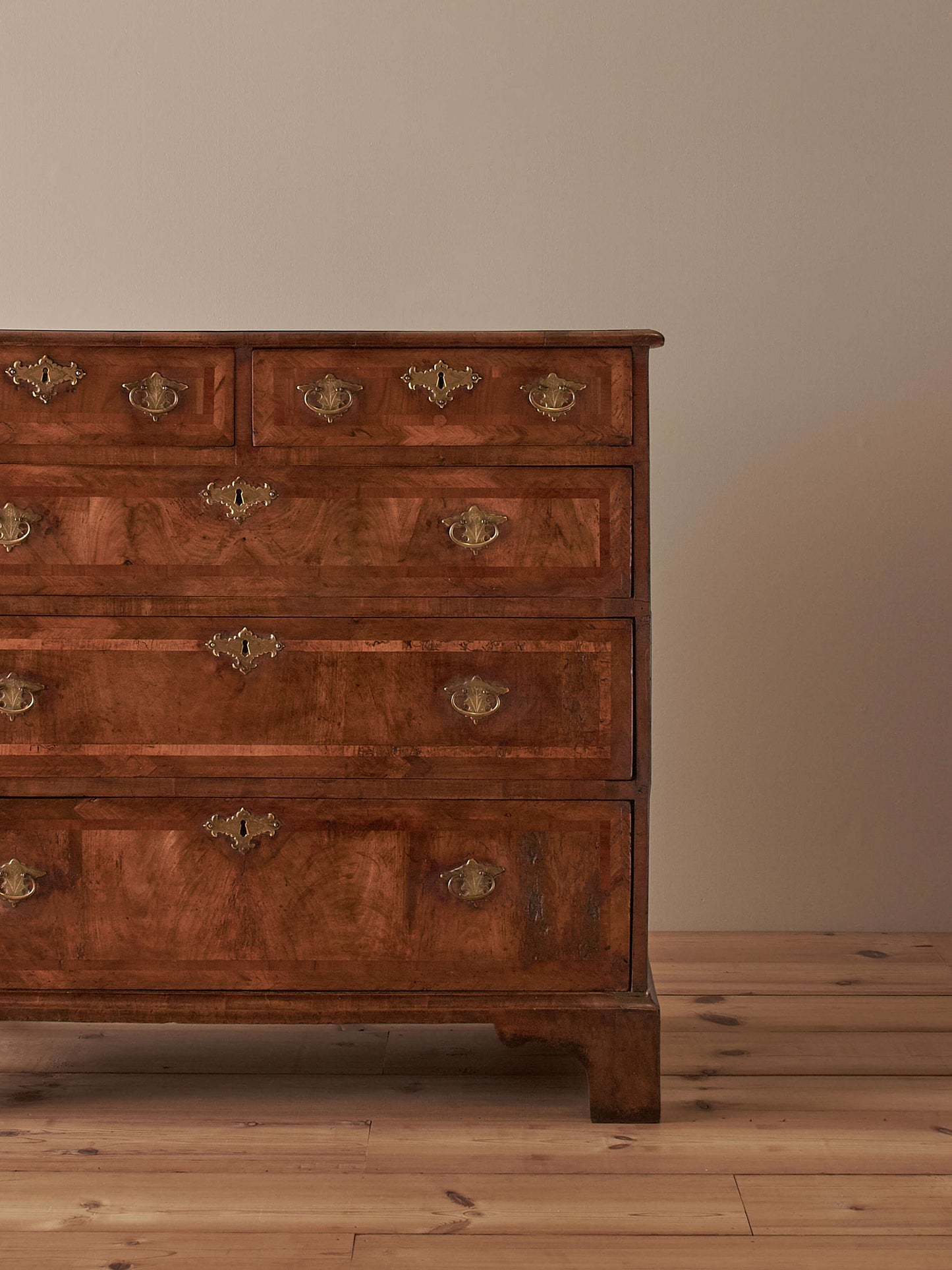 George I walnut cross-banded chest of drawers