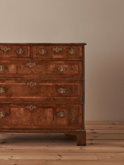 George I walnut cross-banded chest of drawers