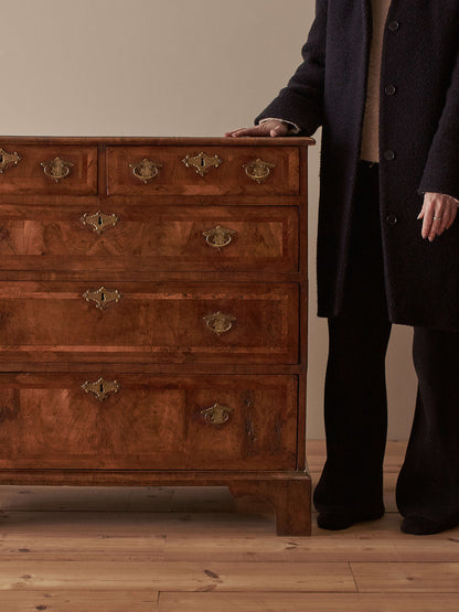 George I walnut cross-banded chest of drawers