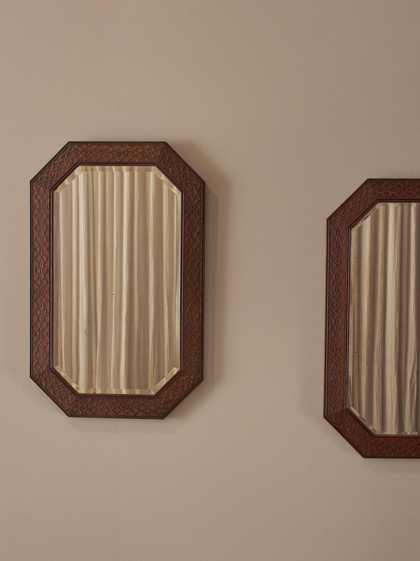 Pair of Edwardian carved mirrors