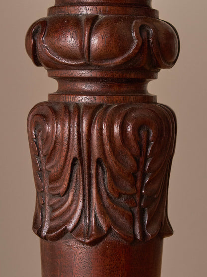 Antique William IV mahogany dining table on brass castors