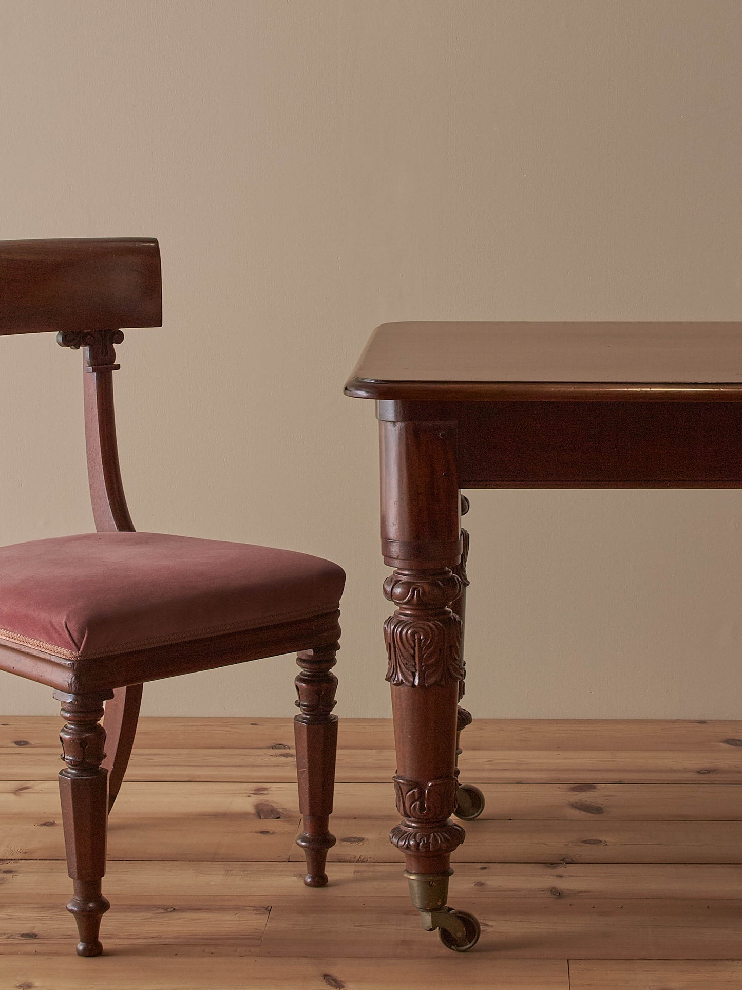 Antique William IV mahogany dining table on brass castors