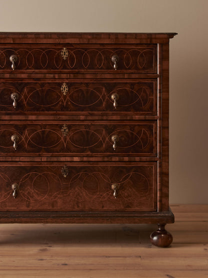 Queen Anne antique olive-oyster chest of drawers on bun feet