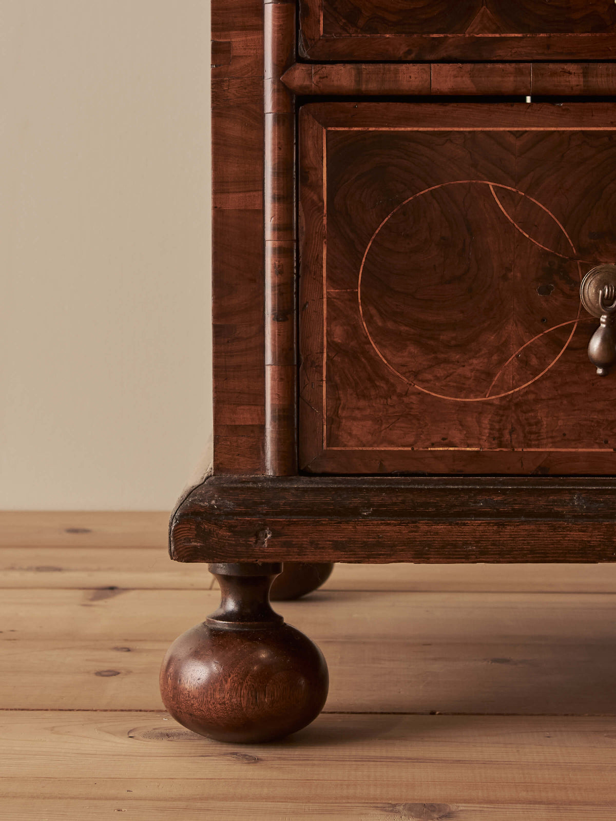Queen Anne antique olive-oyster chest of drawers on bun feet
