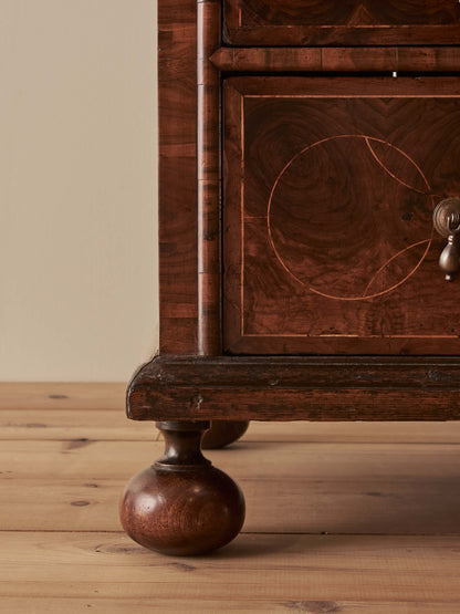 Queen Anne antique olive-oyster chest of drawers on bun feet