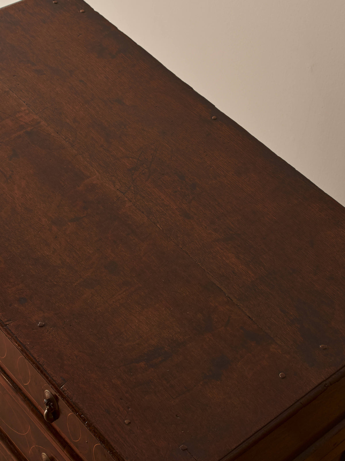 Queen Anne antique olive-oyster chest of drawers on bun feet