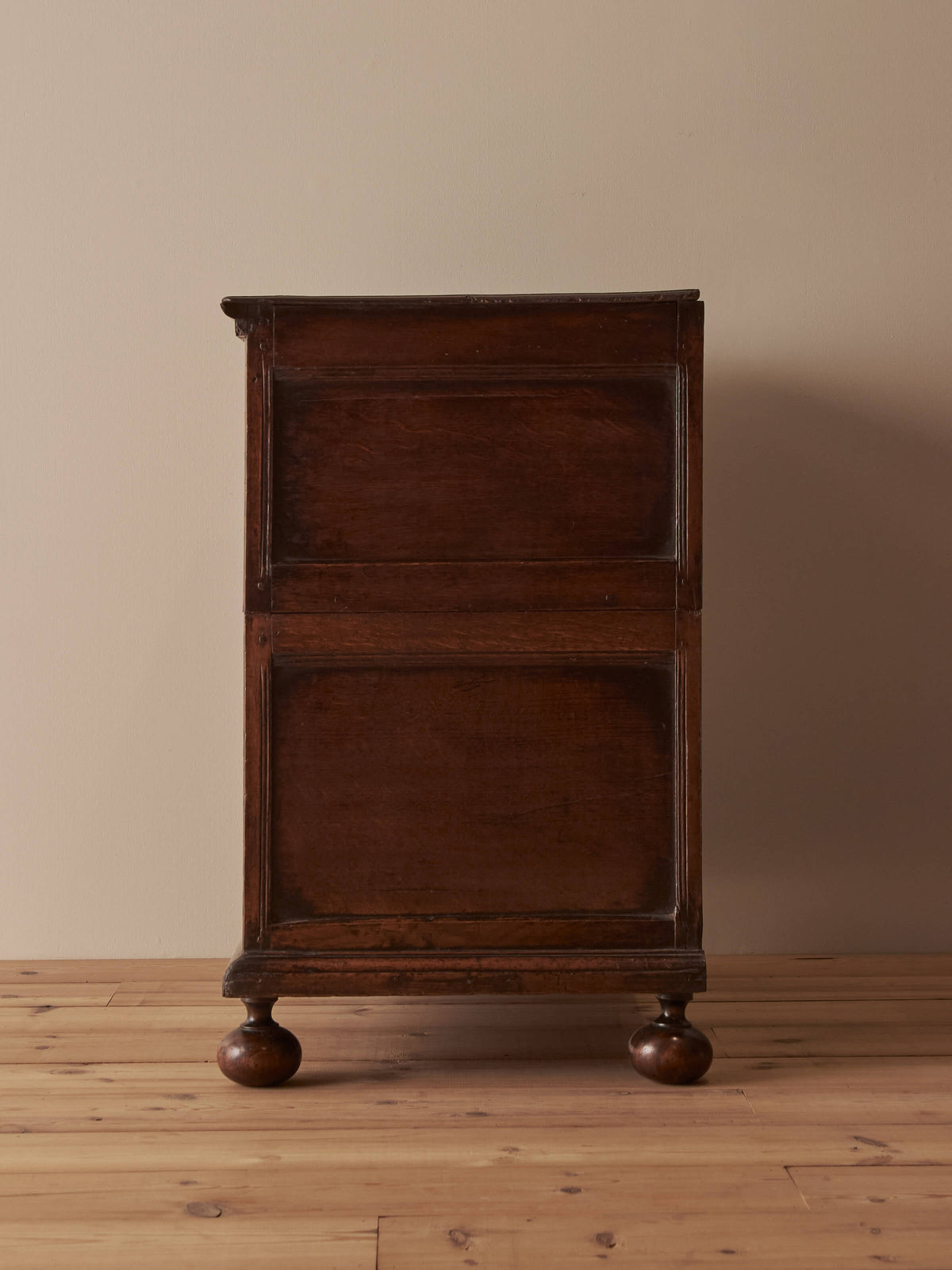 Queen Anne antique olive-oyster chest of drawers on bun feet