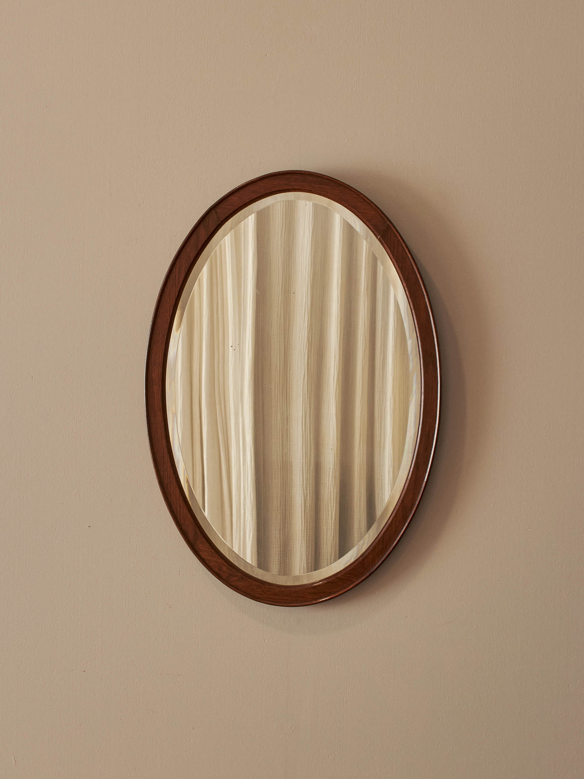 Art Deco oak oval bevelled mirror