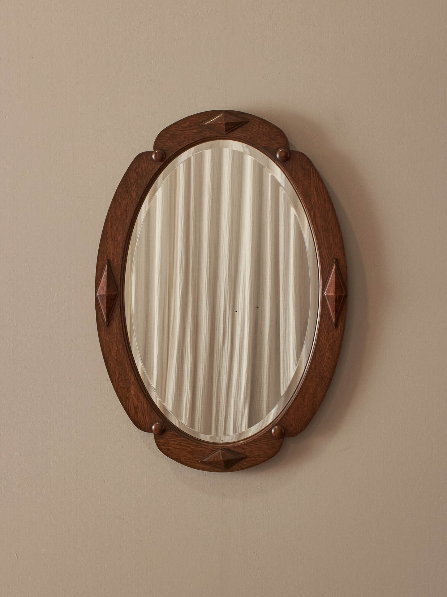 Edwardian oak oval mirror