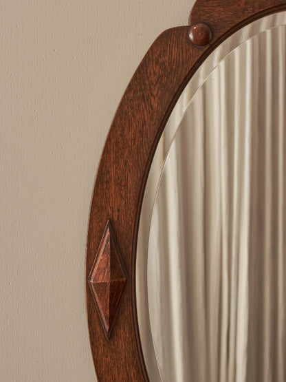 Edwardian oak oval mirror