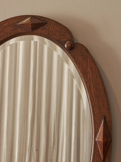 Edwardian oak oval mirror