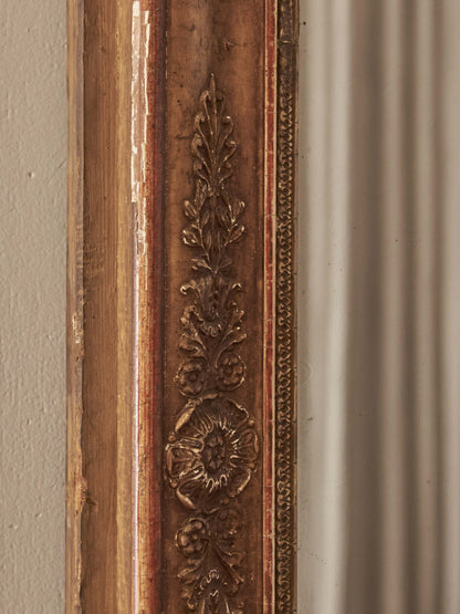 French antique gilt mirror with floral motifs