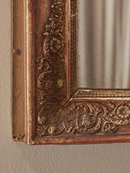 French antique gilt mirror with floral motifs