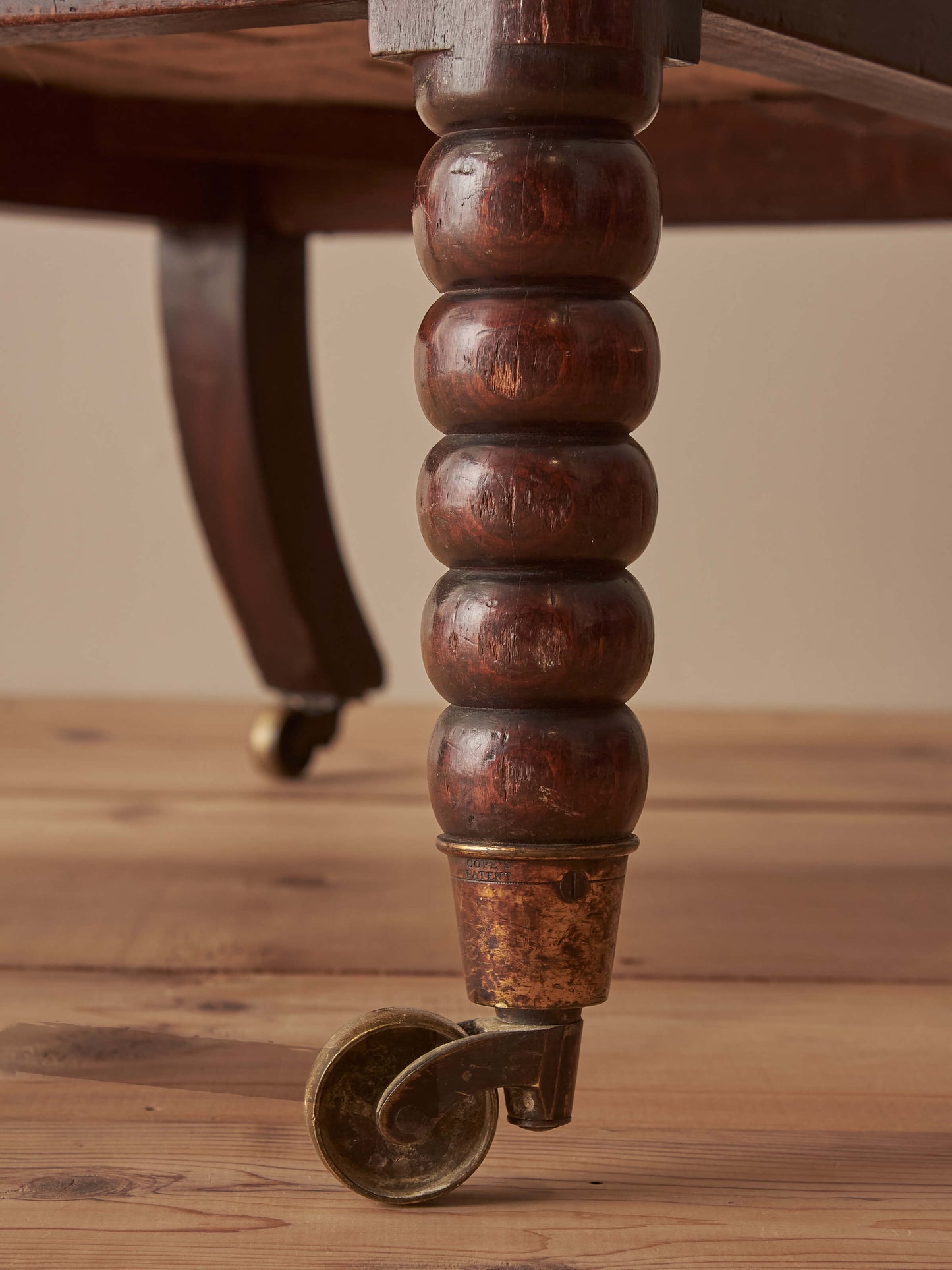 Victorian bobbin armchair raised on castors
