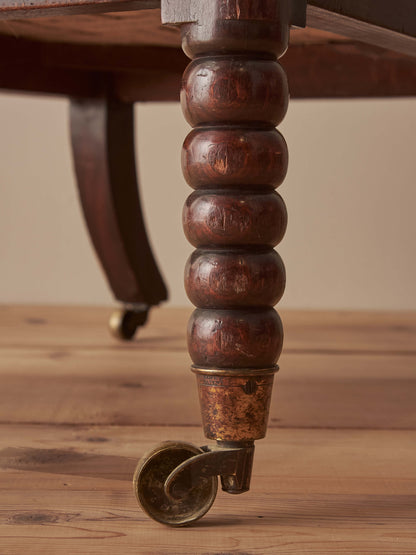 Victorian bobbin armchair raised on castors
