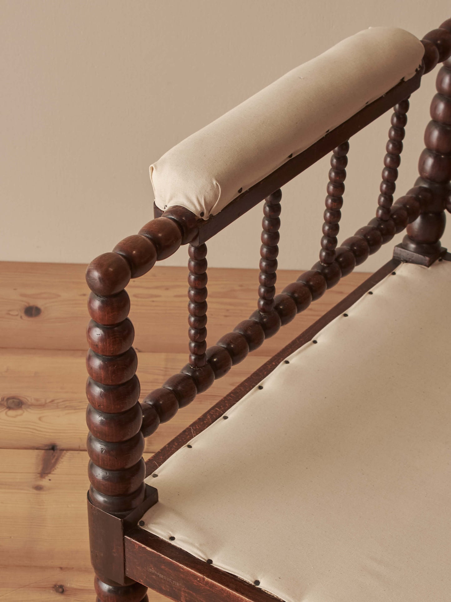Victorian bobbin armchair raised on castors