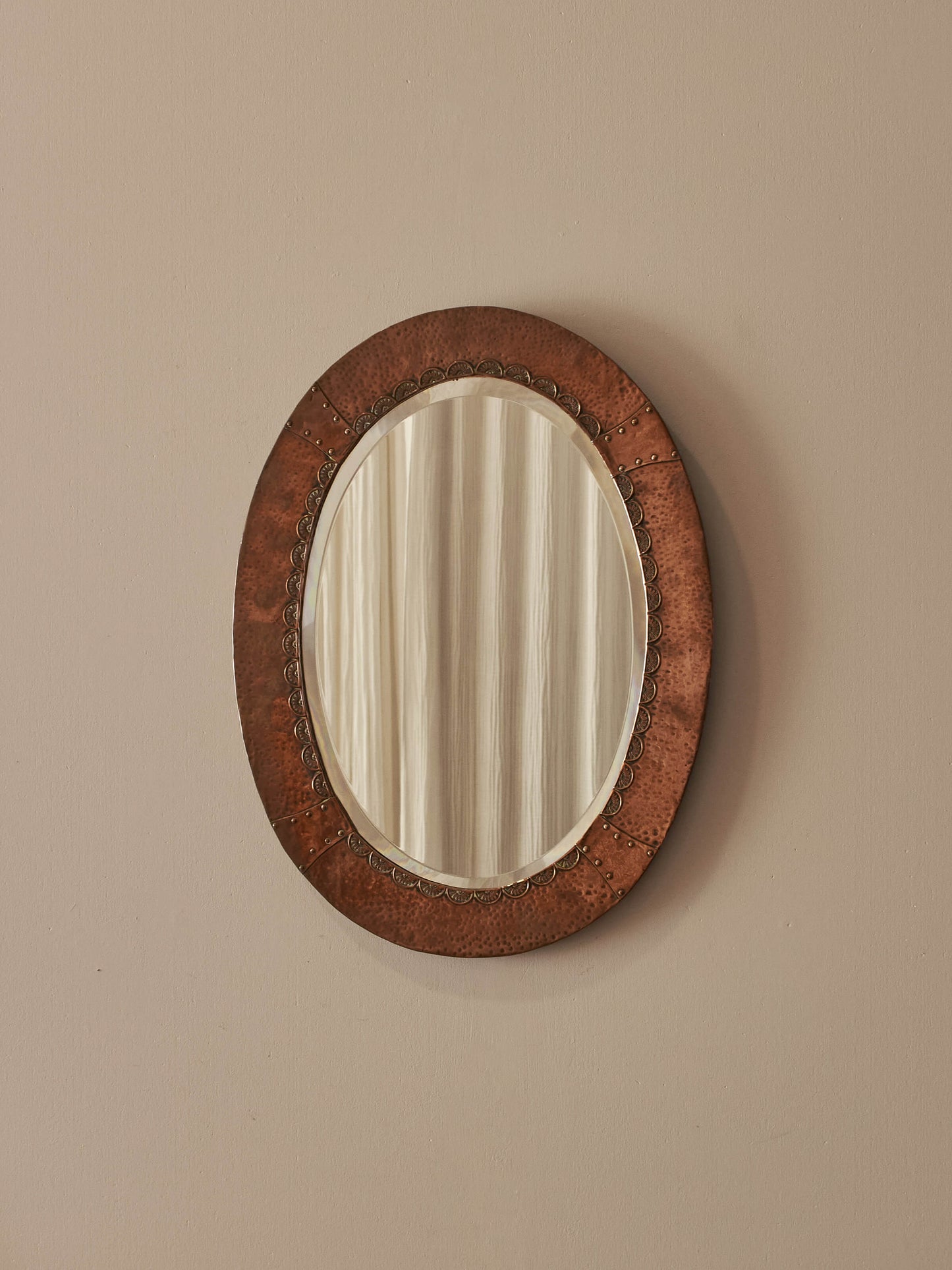Oval Arts and Crafts copper mirror