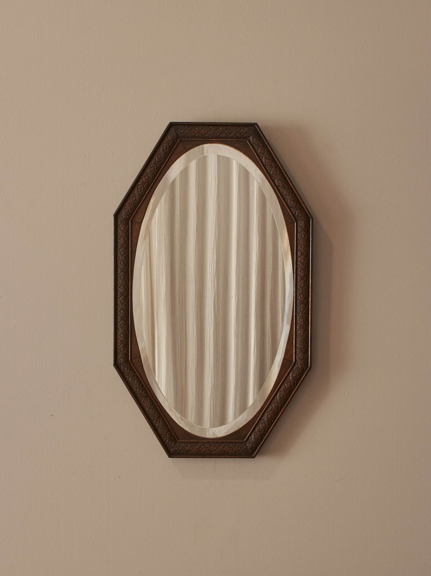 Victorian octagonal carved oak mirror