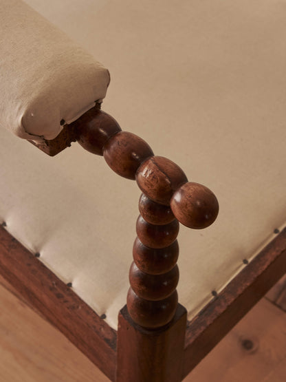 Victorian bobbin armchair raised on castors