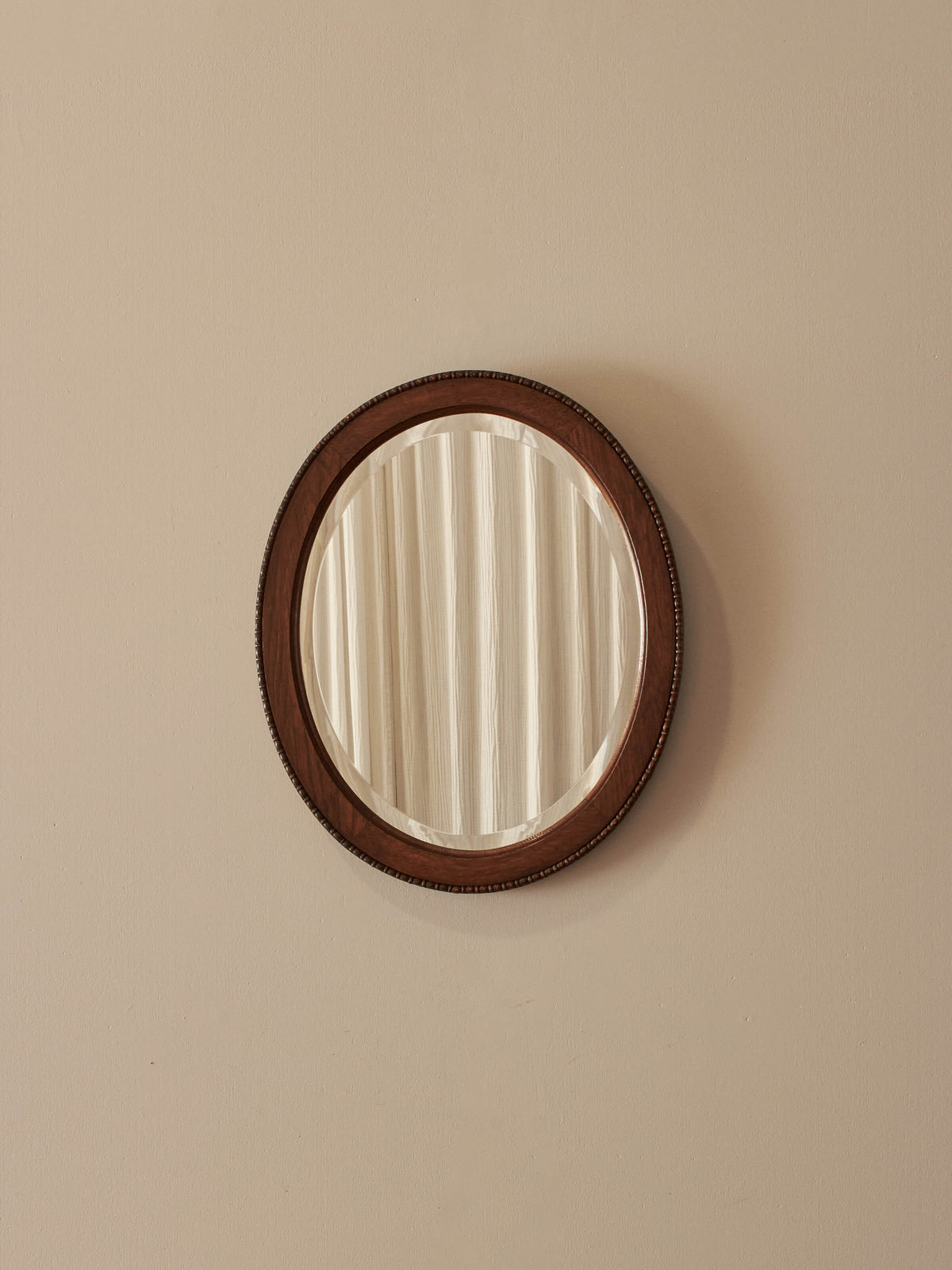 Antique oak bobbin-beaded mirror