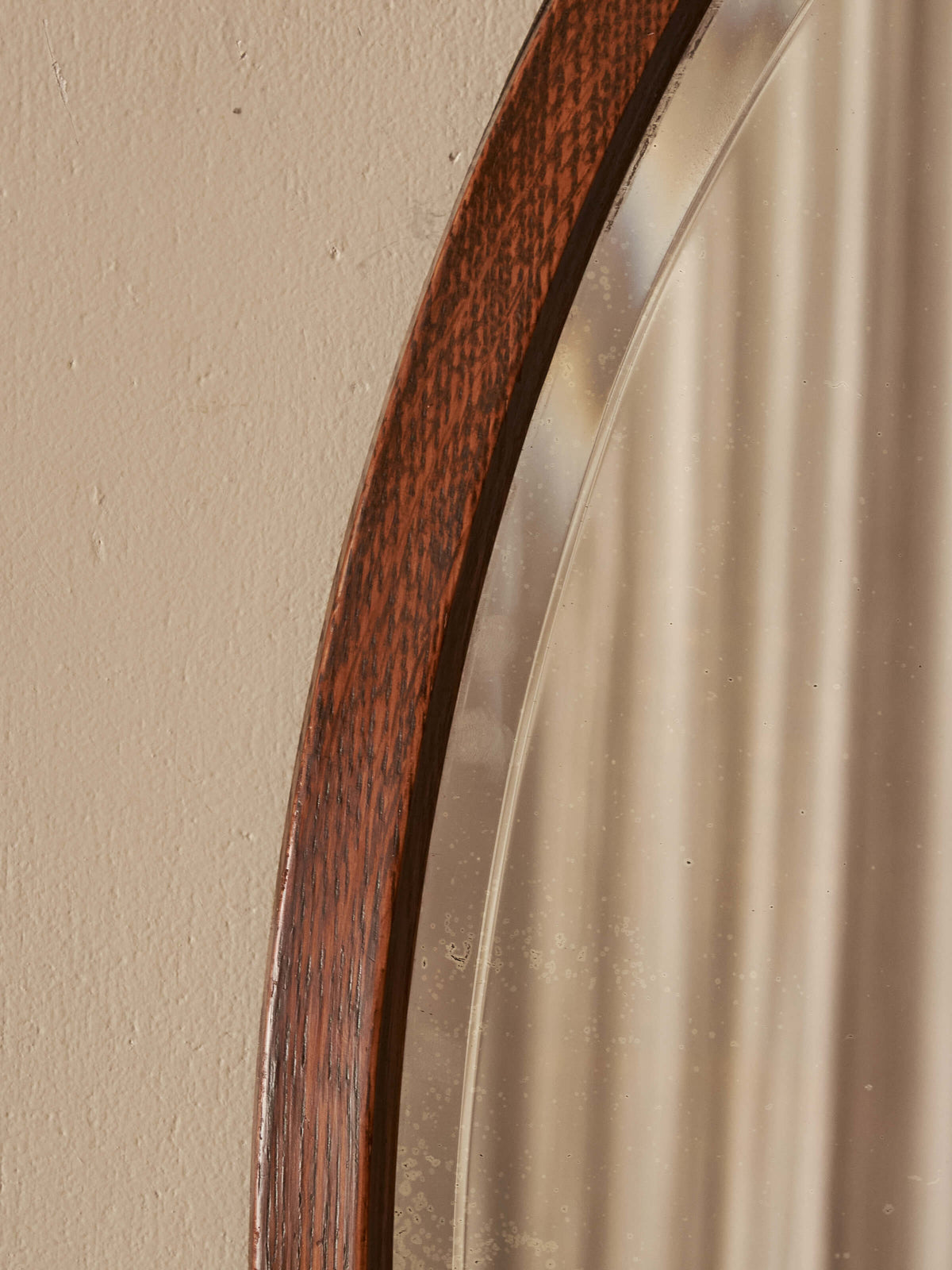 Antique oval oak bevelled mirror