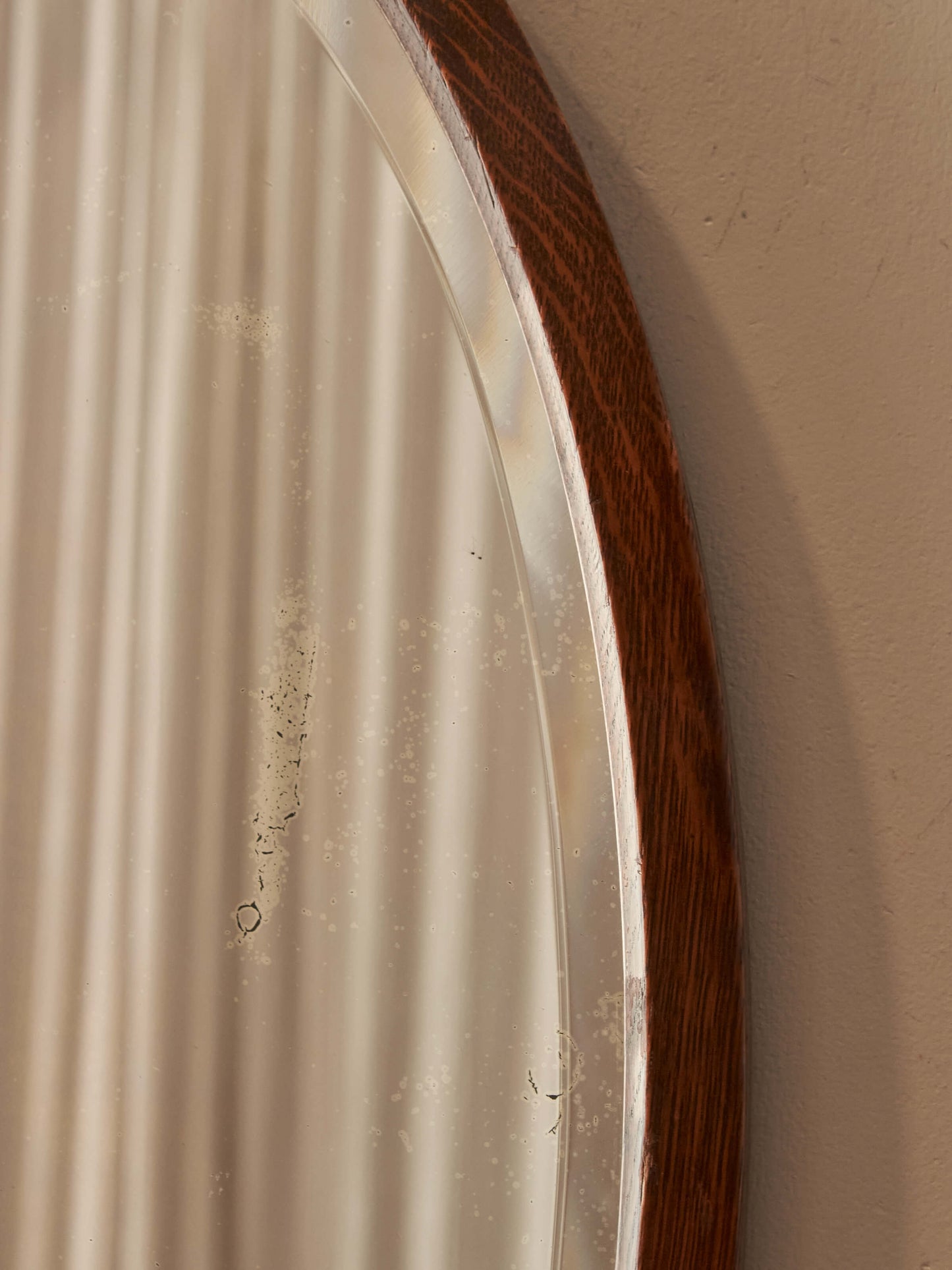 Antique oval oak bevelled mirror