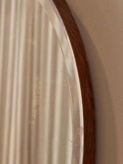Antique oval oak bevelled mirror