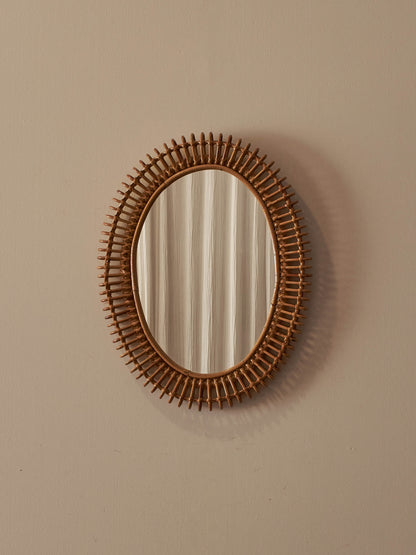 Italian oval mid-century rattan mirror