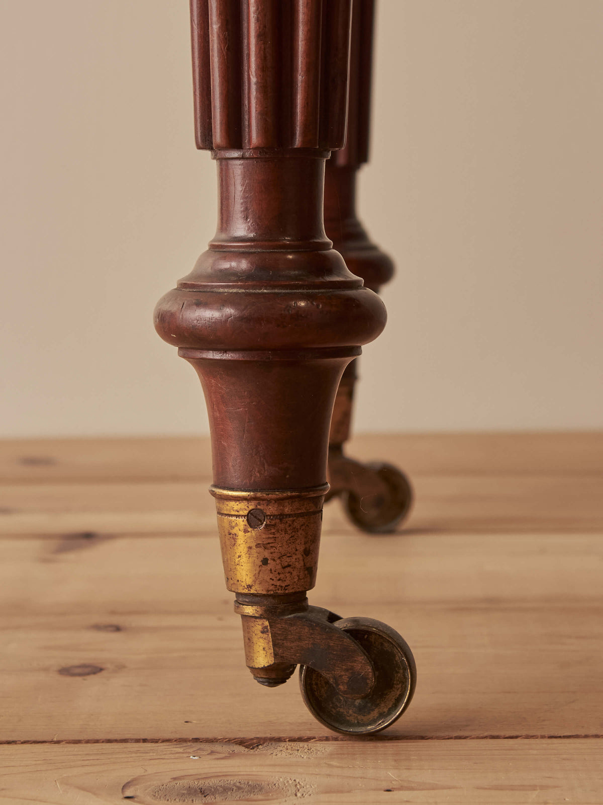 Early Victorian mahogany writing table with fluted legs