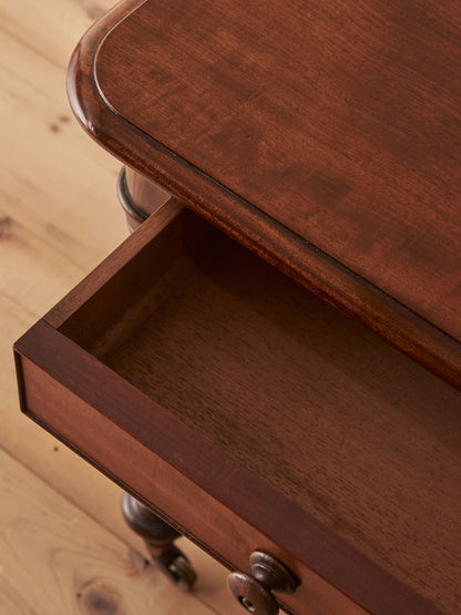 Early Victorian mahogany writing table with fluted legs
